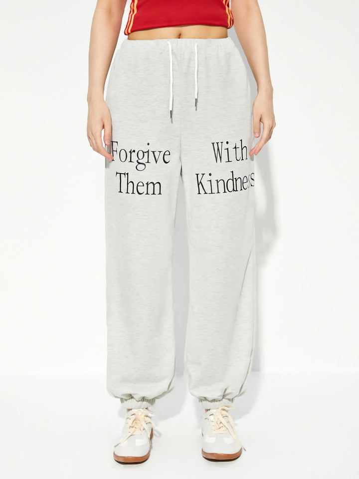 Kvinnors avslappnade joggers med grafiskt tryck och elastisk midjeband Mirla-Eva Jonsson