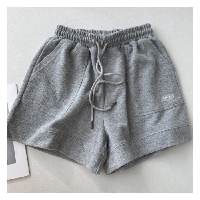 Kvinnors avslappnade joggingshorts med elastisk midja och praktiska sidofickor-Eva Jonsson