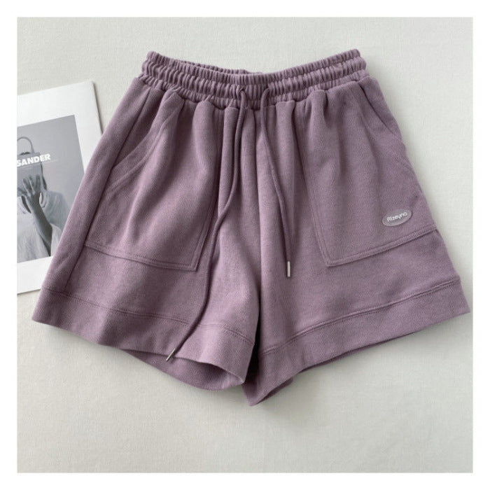 Kvinnors avslappnade joggingshorts med elastisk midja och praktiska sidofickor-Eva Jonsson