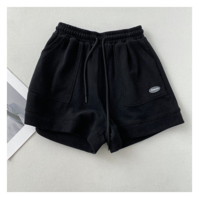Kvinnors avslappnade joggingshorts med elastisk midja och praktiska sidofickor-Eva Jonsson