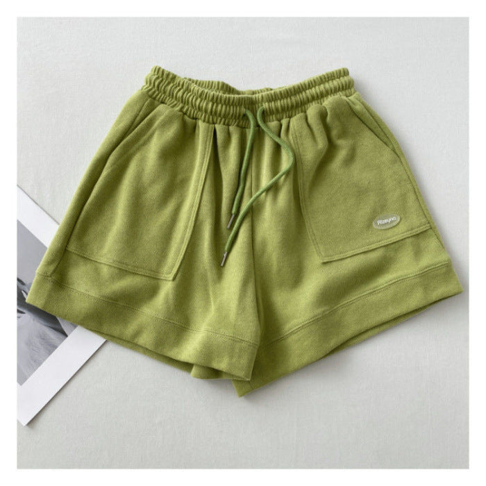 Kvinnors avslappnade joggingshorts med elastisk midja och praktiska sidofickor-Eva Jonsson