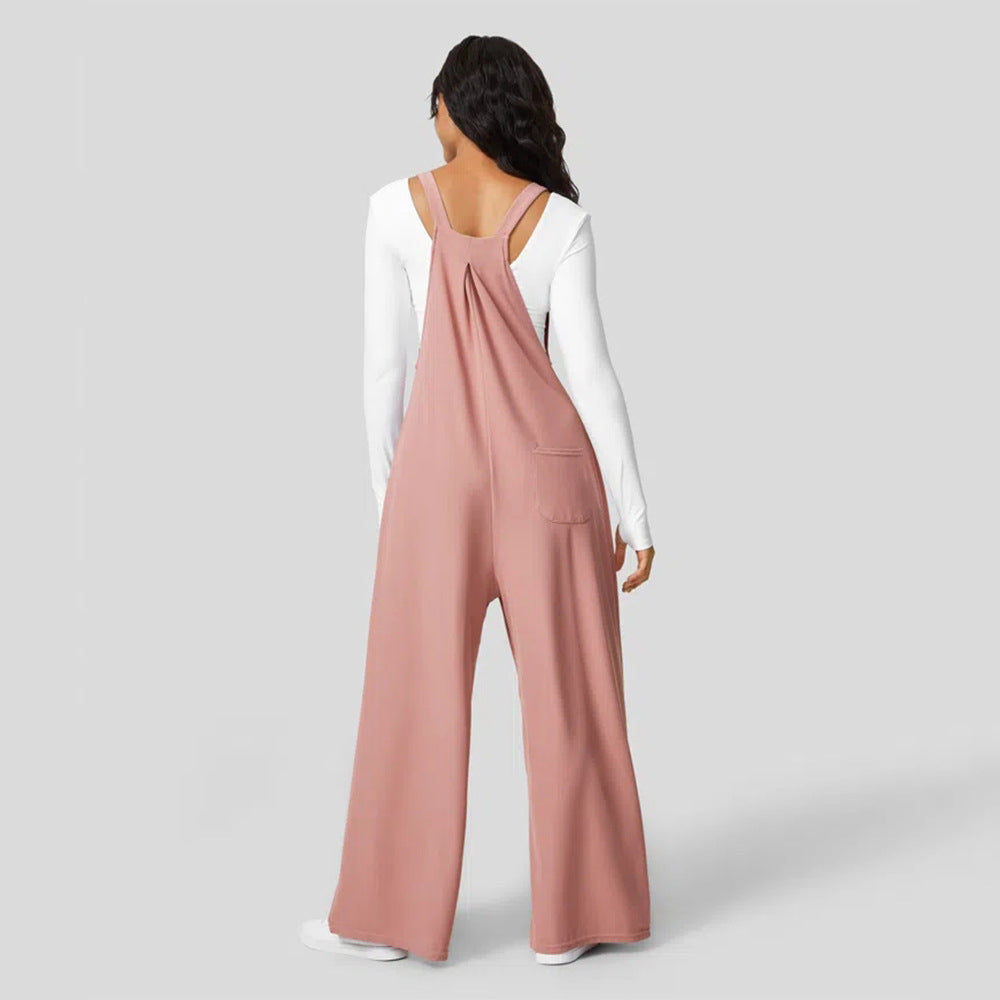 Kvinnors avslappnade jumpsuit med breda ben och elegant knappdetalj Mirla-Eva Jonsson