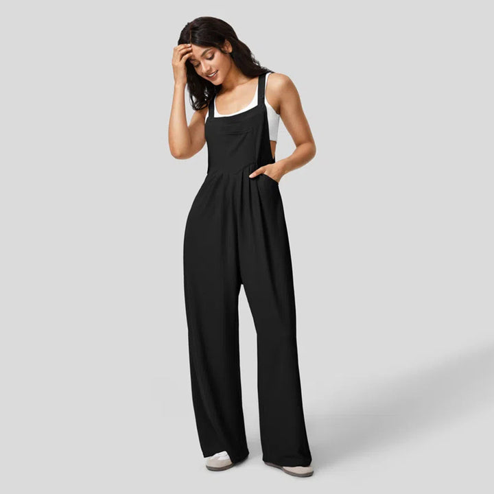 Kvinnors avslappnade jumpsuit med breda ben och elegant knappdetalj Mirla-Eva Jonsson