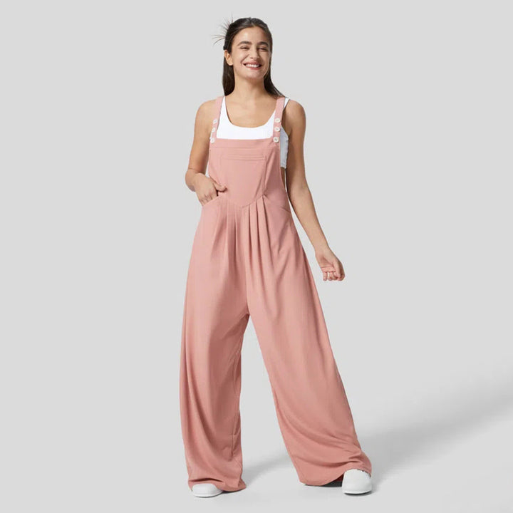 Kvinnors avslappnade jumpsuit med breda ben och elegant knappdetalj Mirla-Eva Jonsson