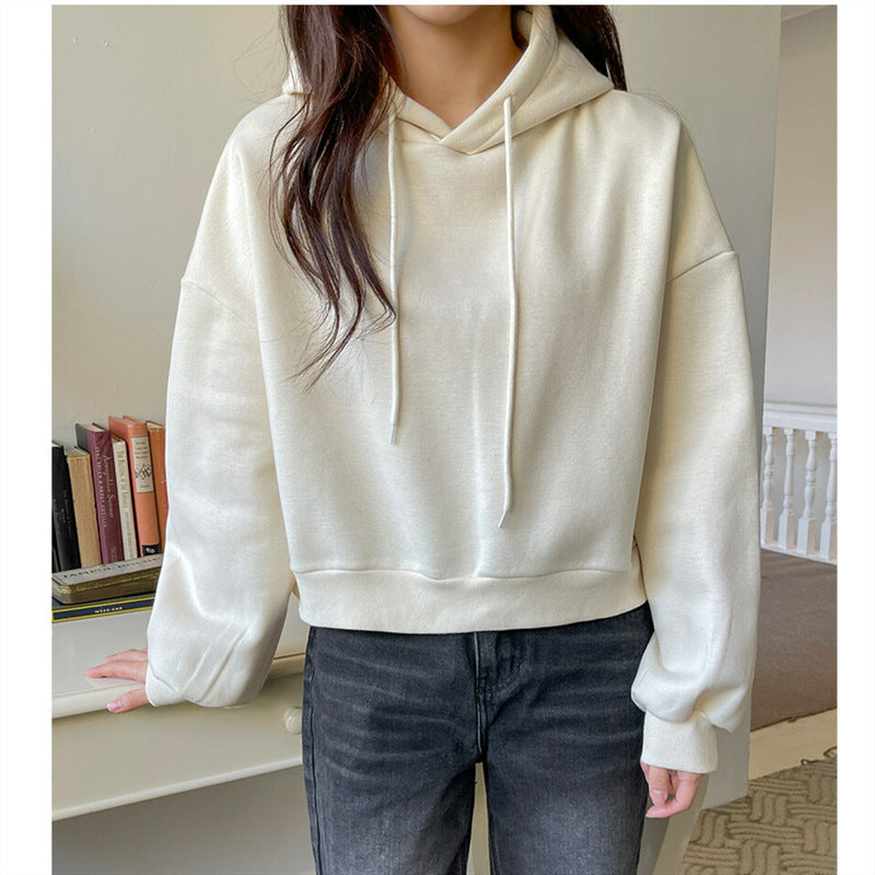 Kvinnors avslappnade kort hoodie med voluminösa ärmar Mirla-Eva Jonsson