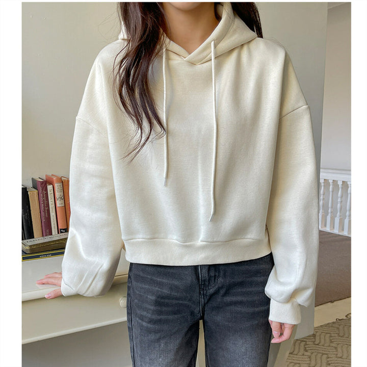 Kvinnors avslappnade kort hoodie med voluminösa ärmar Mirla-Eva Jonsson