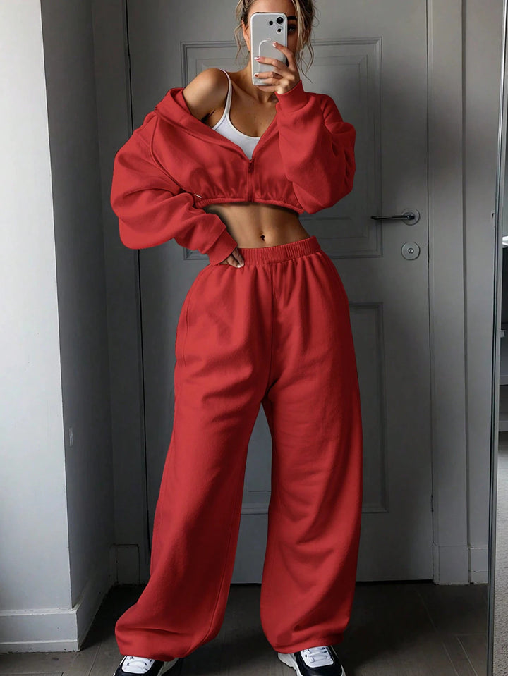 Kvinnors avslappnade kortärmad sweatshirt och breda högmidjade joggingsbyxor set Mirla-Eva Jonsson