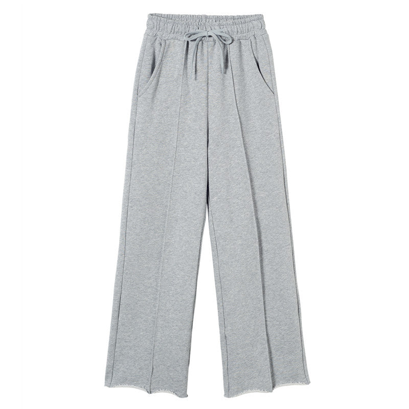 Kvinnors avslappnade loungewear-set med kortad zip hoodie och vida byxor Mirla-Eva Jonsson