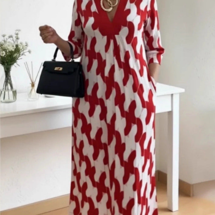 Kvinnors avslappnade maxiklänning med elegant V-hals och praktiska sidofickor Mirla-Eva Jonsson
