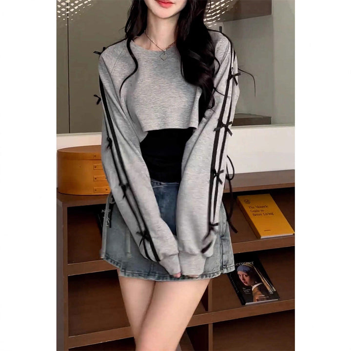 Kvinnors avslappnade oversized cropped topp med trendiga knytband Mirla-Eva Jonsson
