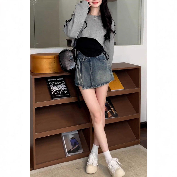 Kvinnors avslappnade oversized cropped topp med trendiga knytband Mirla-Eva Jonsson