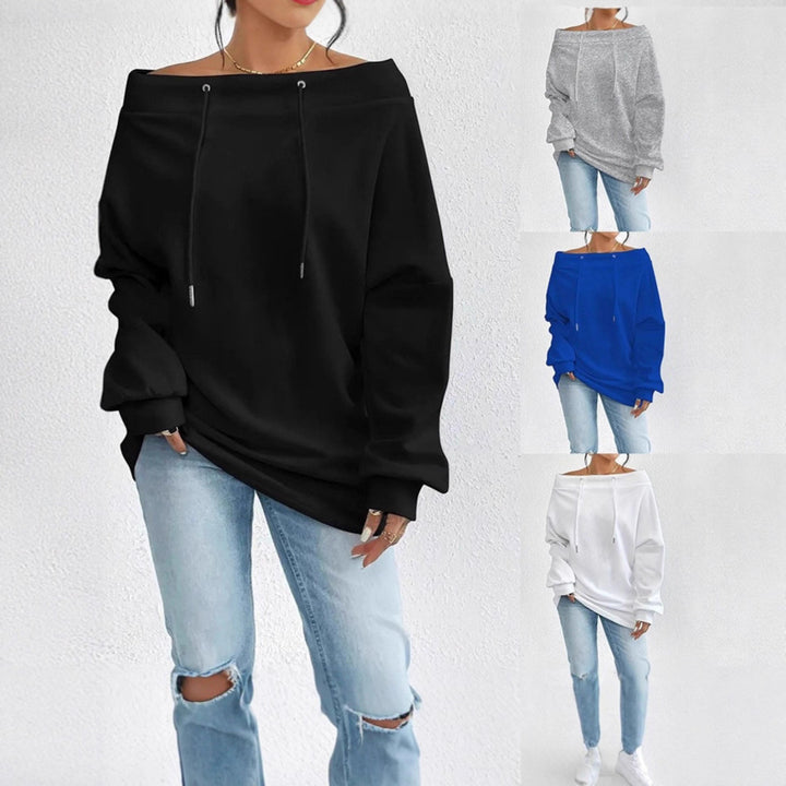 Kvinnors avslappnade oversized pullover med öppen krage och praktiska dragsnören Mirla-Eva Jonsson