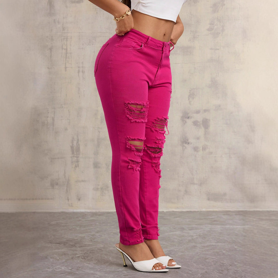 Kvinnors avslappnade skinny jeans med förstörda detaljer och hög midja Mirla-Eva Jonsson