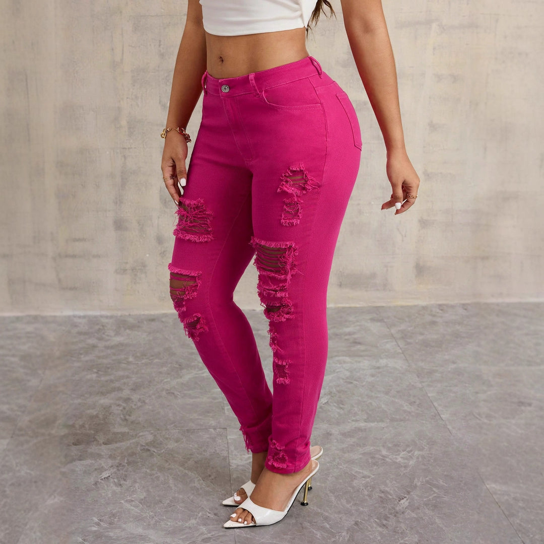 Kvinnors avslappnade skinny jeans med förstörda detaljer och hög midja Mirla-Eva Jonsson