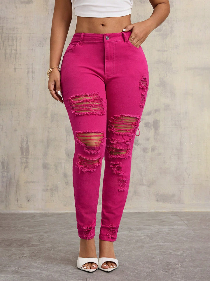Kvinnors avslappnade skinny jeans med förstörda detaljer och hög midja Mirla-Eva Jonsson