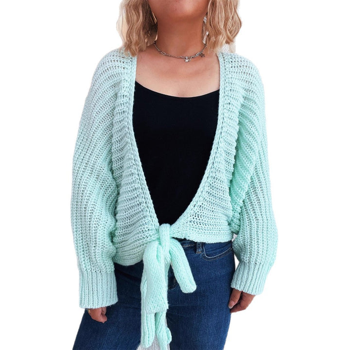 Kvinnors avslappnade stickad cardigan med trendiga knytband och oversize passform Mirla-Eva Jonsson