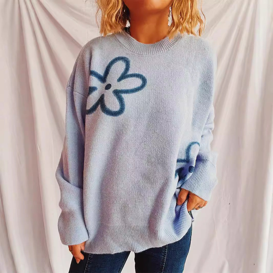 Kvinnors avslappnade stickad tröja med blommönster och oversized passform Mirla-Eva Jonsson