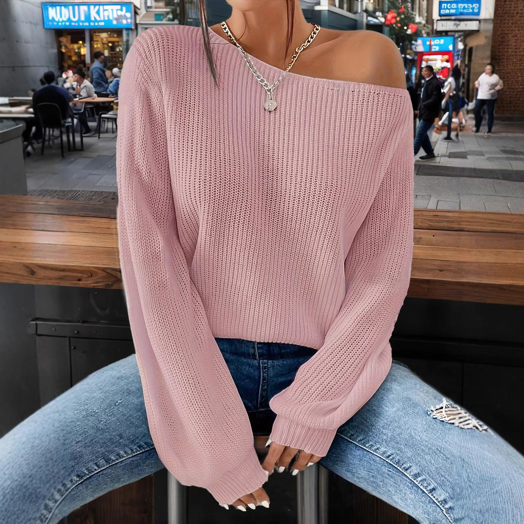 Kvinnors avslappnade stickad tröja med lös passform och öppen axeldesign Mirla-Eva Jonsson