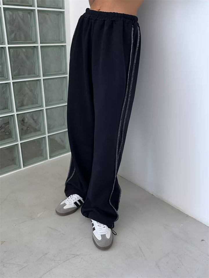 Kvinnors avslappnade sweatpants med breda ben och elastiskt midjeband Mirla-Eva Jonsson