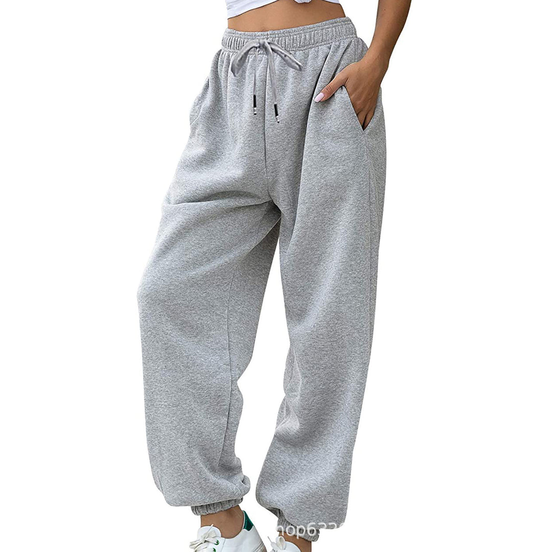 Kvinnors avslappnade sweatpants med hög midja och sid dragkedjefickor Mirla-Eva Jonsson
