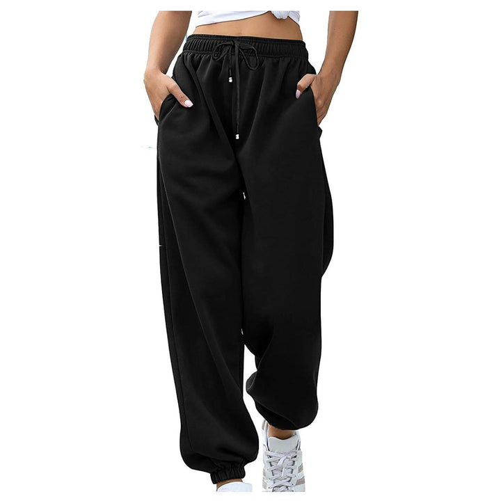 Kvinnors avslappnade sweatpants med hög midja och sid dragkedjefickor Mirla-Eva Jonsson