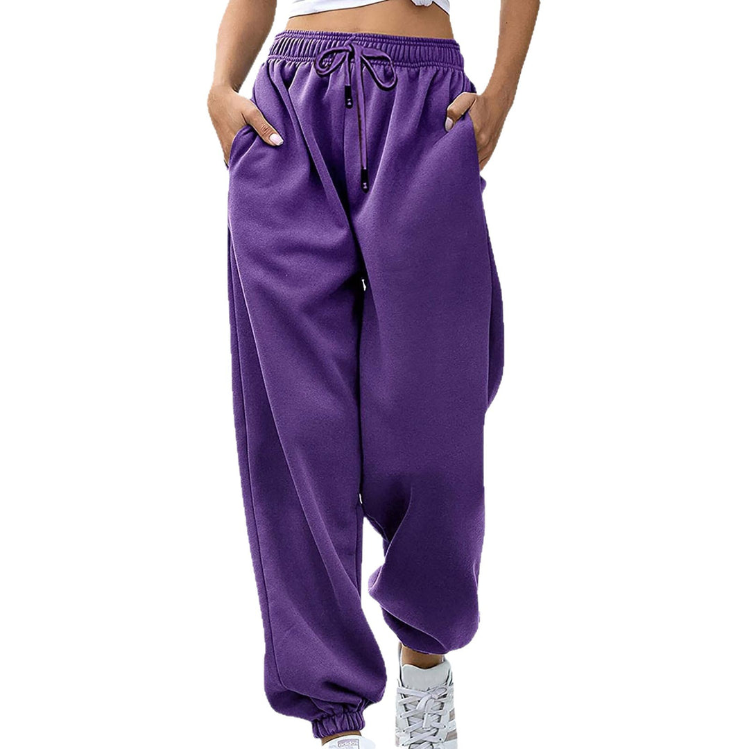 Kvinnors avslappnade sweatpants med hög midja och sid dragkedjefickor Mirla-Eva Jonsson
