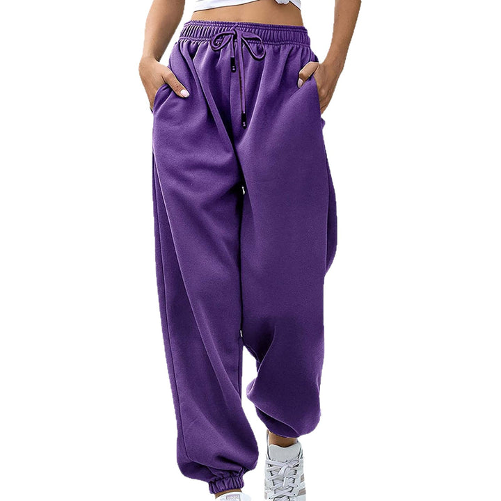 Kvinnors avslappnade sweatpants med hög midja och sid dragkedjefickor Mirla-Eva Jonsson