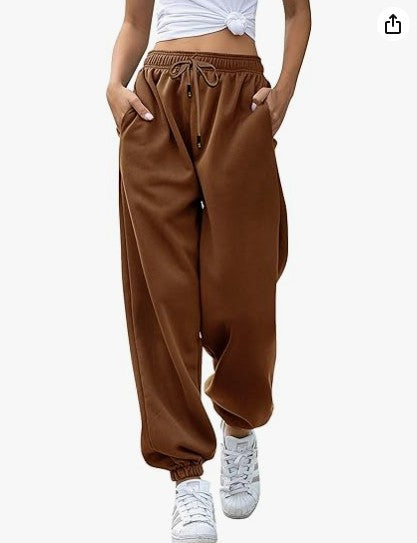 Kvinnors avslappnade sweatpants med hög midja och sid dragkedjefickor Mirla-Eva Jonsson