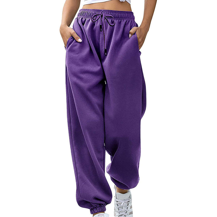 Kvinnors avslappnade sweatpants med hög midja och sid dragkedjefickor Mirla-Eva Jonsson