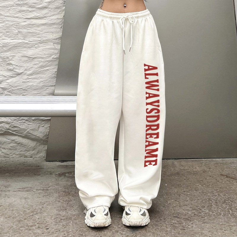 Kvinnors avslappnade sweatpants med motiverande text och elastisk midjeband Mirla-Eva Jonsson