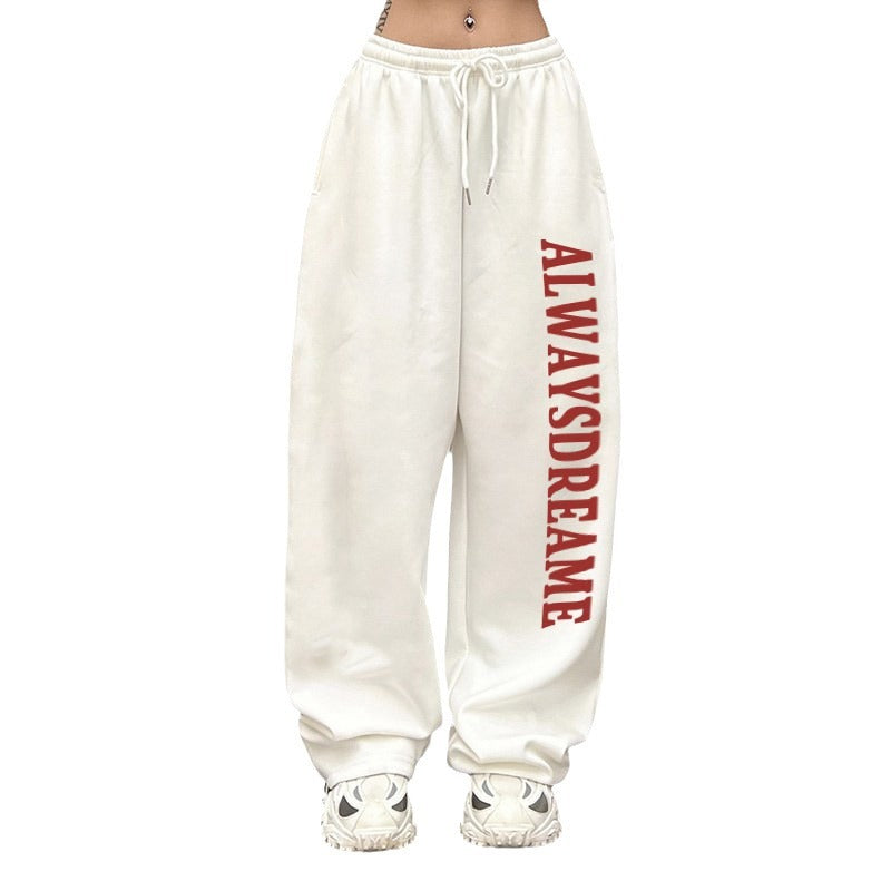Kvinnors avslappnade sweatpants med motiverande text och elastisk midjeband Mirla-Eva Jonsson