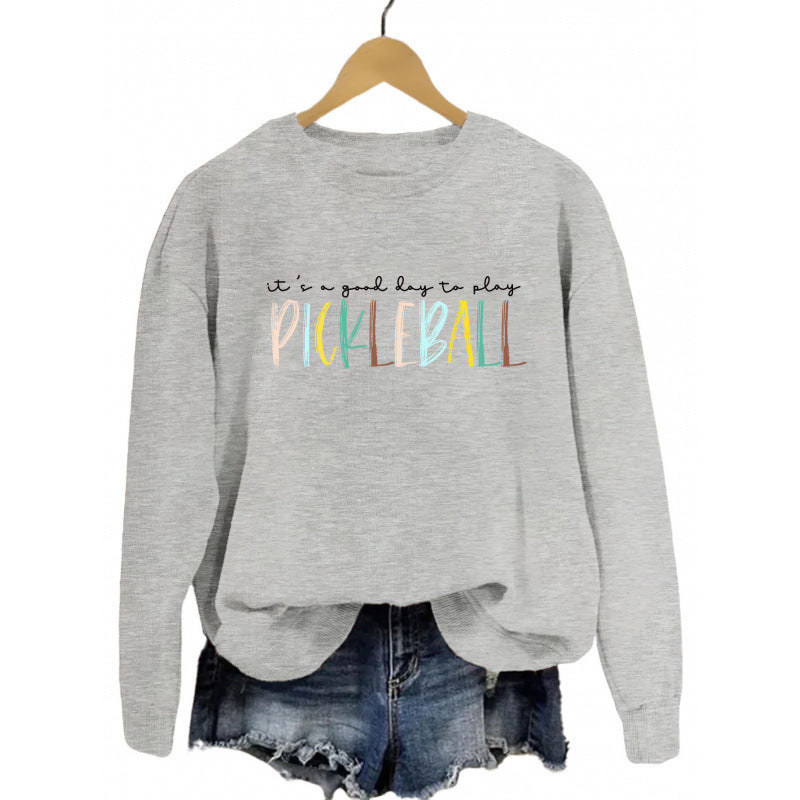 Kvinnors avslappnade sweatshirt med färggrafisk pickleball tryck Mirla-Eva Jonsson