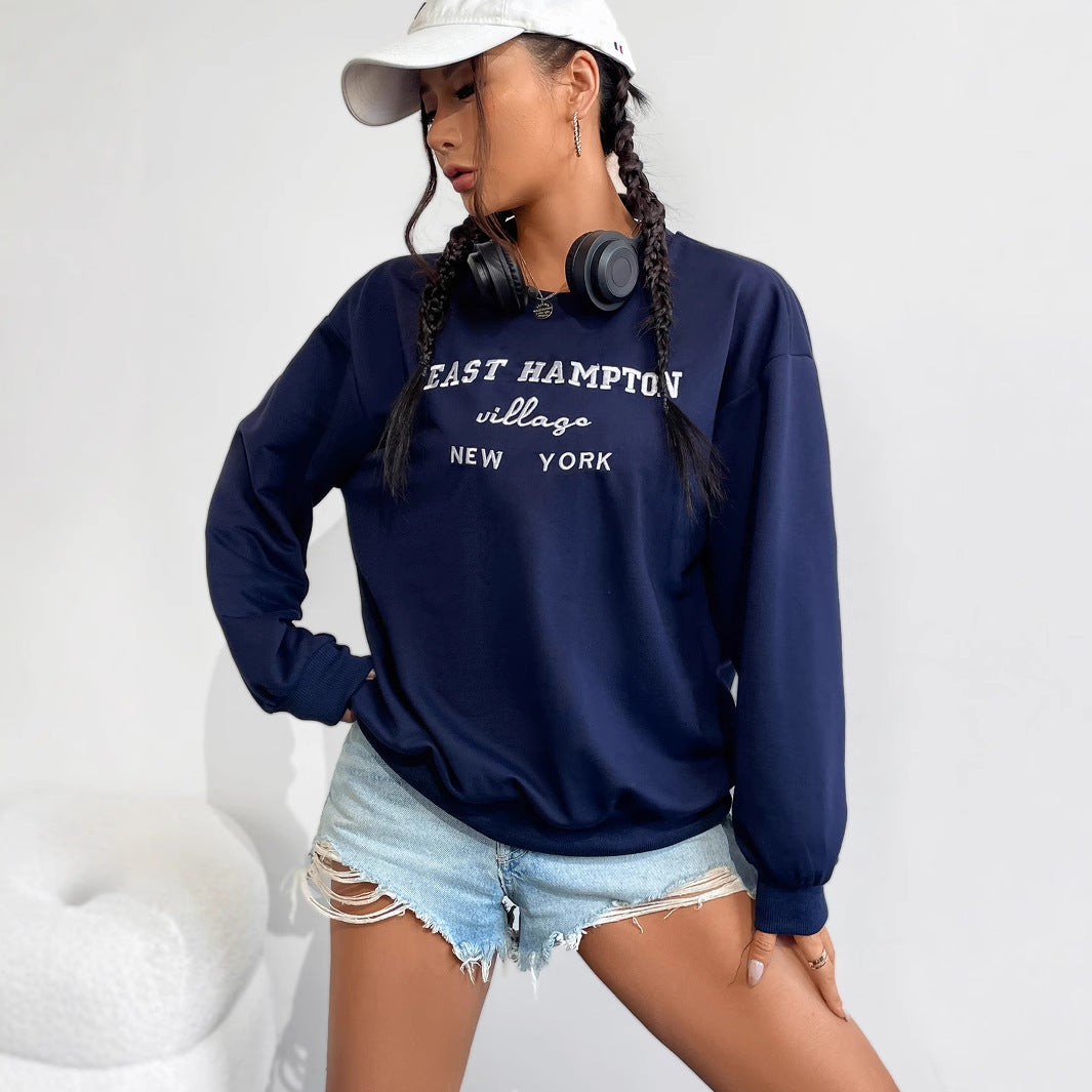 Kvinnors avslappnade sweatshirt med kreativ text och bekväm passform Mirla-Eva Jonsson