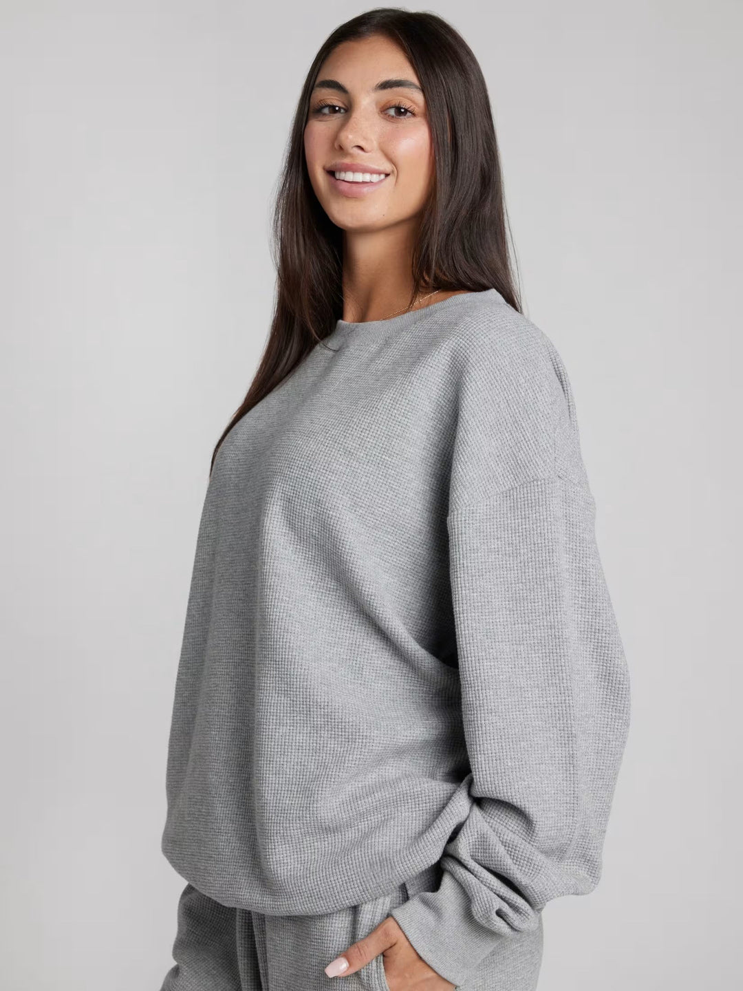 Kvinnors avslappnade sweatshirt med stort våffelmönster och bekväma manschetter Mirla-Eva Jonsson