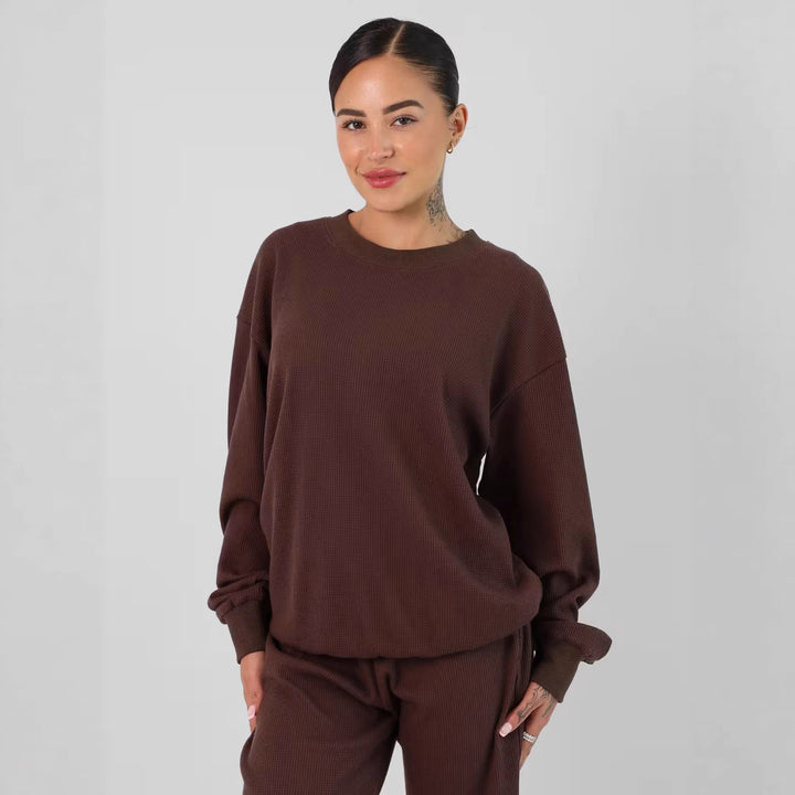 Kvinnors avslappnade sweatshirt med stort våffelmönster och bekväma manschetter Mirla-Eva Jonsson