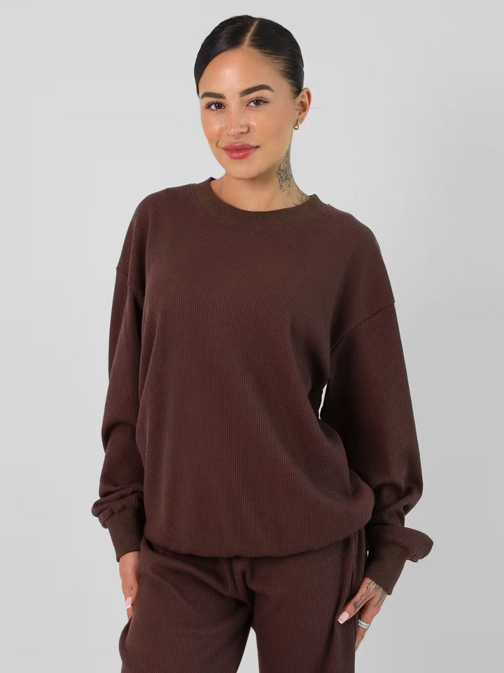 Kvinnors avslappnade sweatshirt med stort våffelmönster och bekväma manschetter Mirla-Eva Jonsson