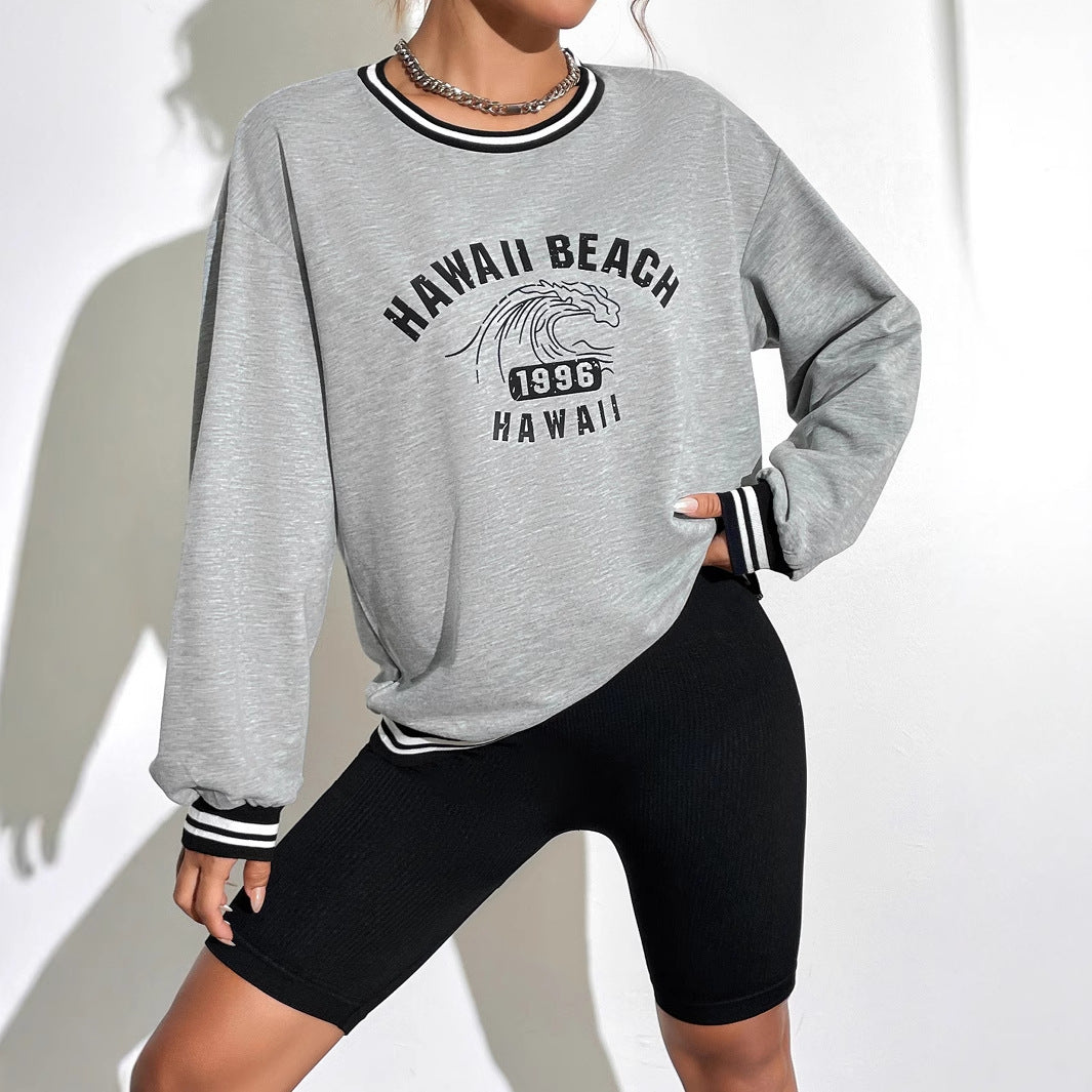 Kvinnors avslappnade sweatshirt med tryckt Hawaii-motiv och sänkta axlar Mirla-Eva Jonsson