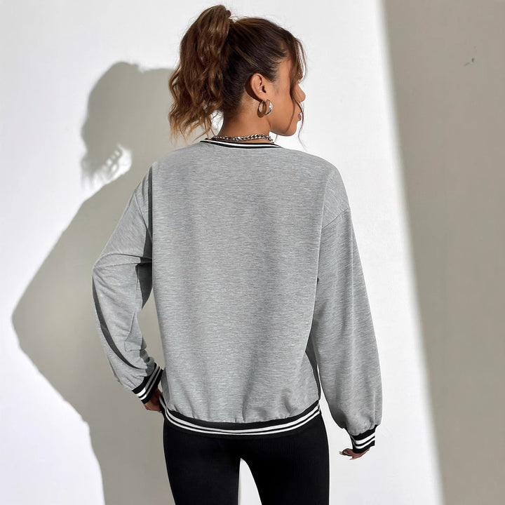 Kvinnors avslappnade sweatshirt med tryckt Hawaii-motiv och sänkta axlar Mirla-Eva Jonsson