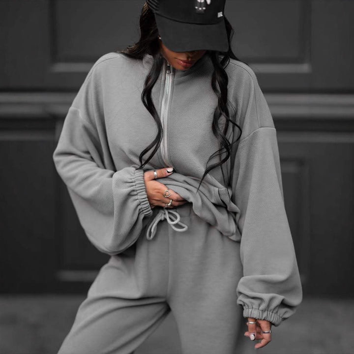 Kvinnors avslappnade sweatshirt set med hög krage och elastiska ärmar Mirla-Eva Jonsson