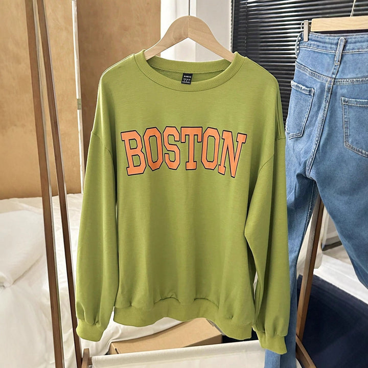 Kvinnors avslappnade sweatshirts med iögonfallande tryck Mirla-Eva Jonsson