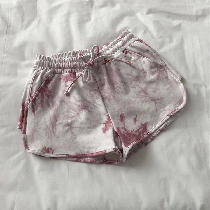 Kvinnors avslappnade sweatshorts med trendig tie-dye-design och praktiska sidofickor-Eva Jonsson