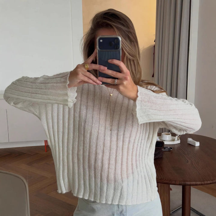Kvinnors avslappnade tröja med ribbad textur och fransade ärmar Mirla-Eva Jonsson