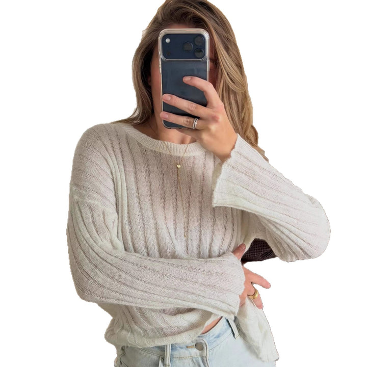 Kvinnors avslappnade tröja med ribbad textur och fransade ärmar Mirla-Eva Jonsson