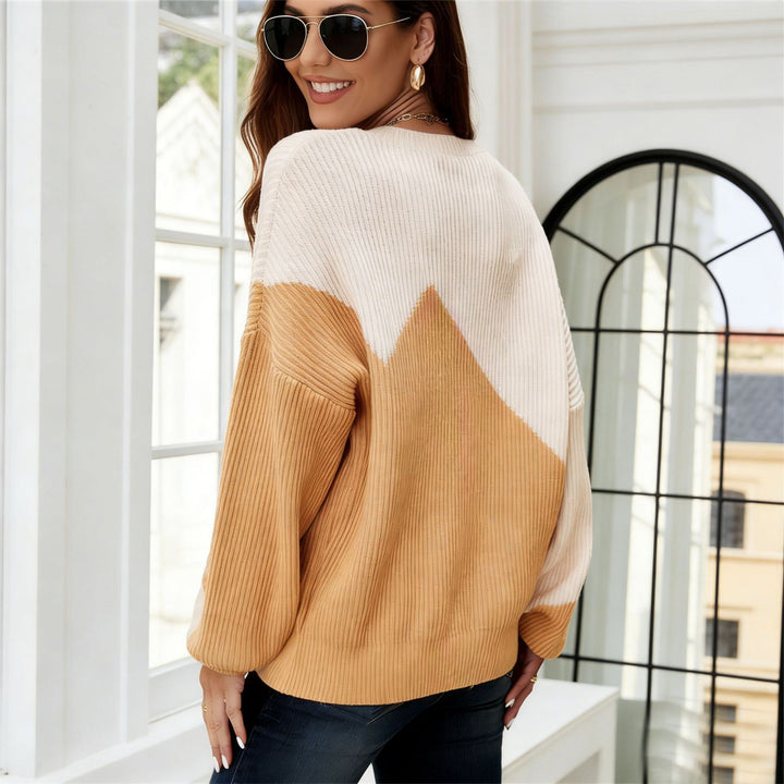 Kvinnors avslappnade tröja med texturerad nålstickning och asymmetrisk design Mirla-Eva Jonsson