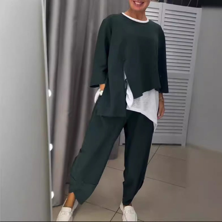 Kvinnors avslappnade tvådelat fritidsset med asymmetrisk topp och bekväma byxor Mirla-Eva Jonsson