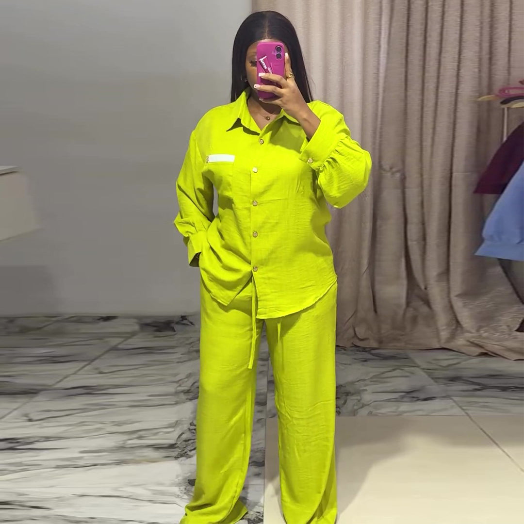 Kvinnors avslappnade tvådelat set med långärmad blus och vida byxor-Eva Jonsson