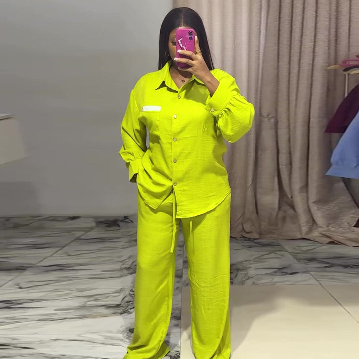 Kvinnors avslappnade tvådelat set med långärmad blus och vida byxor-Eva Jonsson