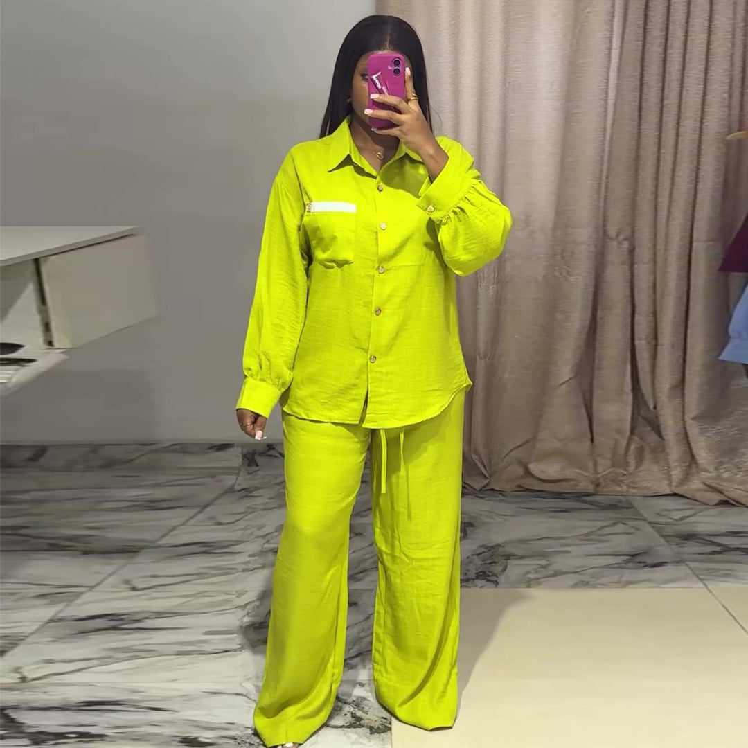 Kvinnors avslappnade tvådelat set med långärmad blus och vida byxor-Eva Jonsson
