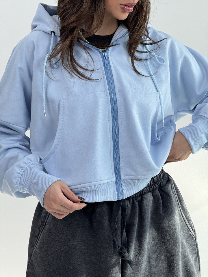 Kvinnors avslappnade zip hoodie med vida ärmar och praktiska fickor-Eva Jonsson