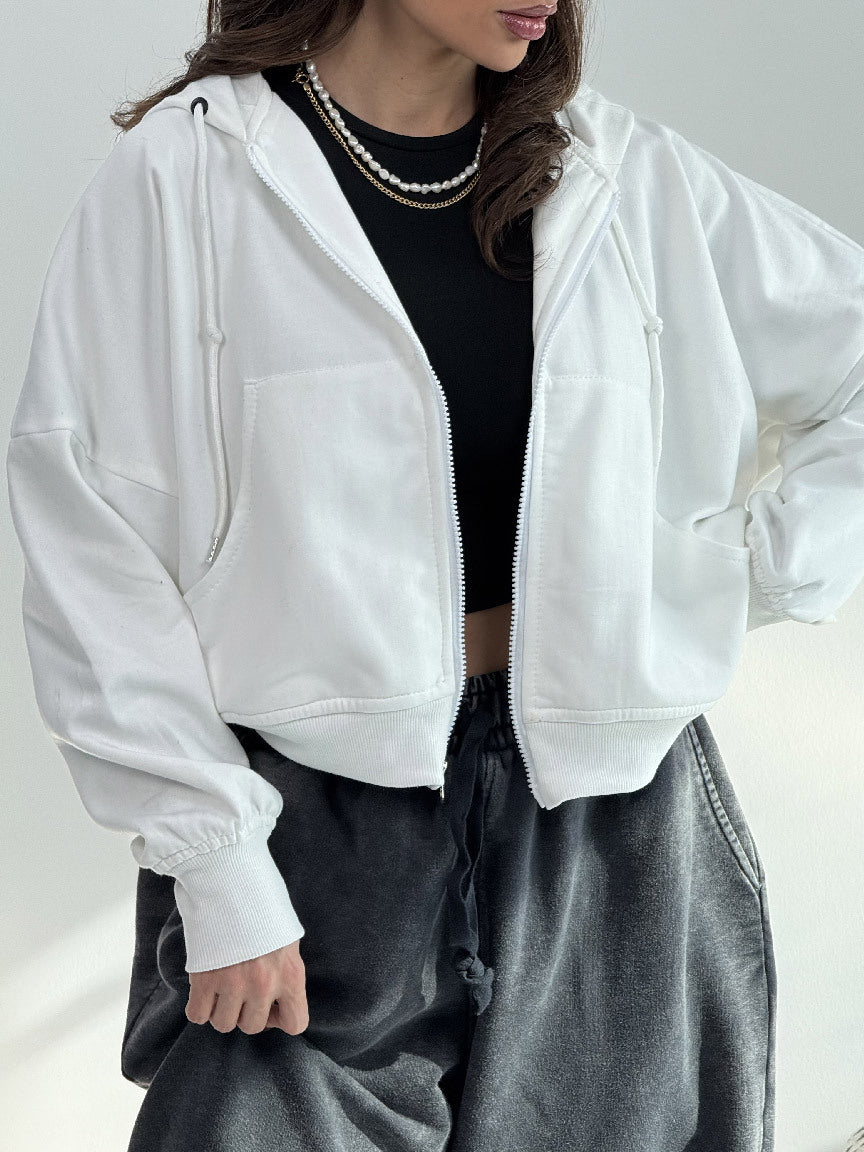 Kvinnors avslappnade zip hoodie med vida ärmar och praktiska fickor-Eva Jonsson